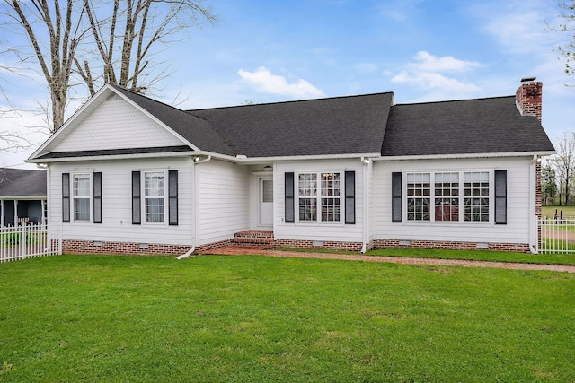 ranch-style house with a front lawn