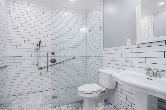 bathroom featuring tiled shower, tile walls, toilet, and tile floors