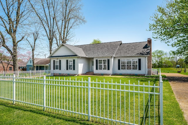 single story home with a front yard