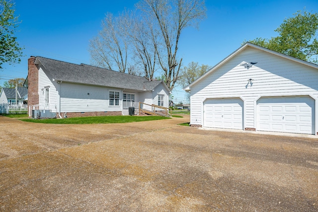 garage with central AC unit