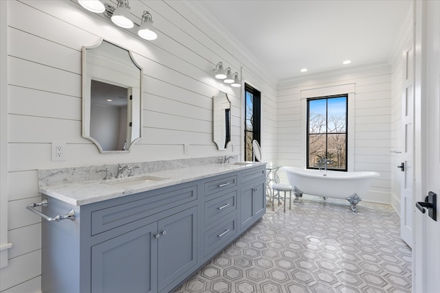 bathroom with wood walls, dual sinks, tile flooring, a bath, and large vanity