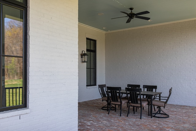 view of patio featuring ceiling fan