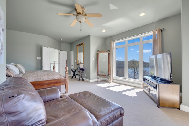 living room with ceiling fan and light carpet