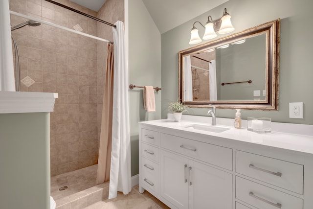 bathroom featuring tile flooring, a shower with shower curtain, and vanity