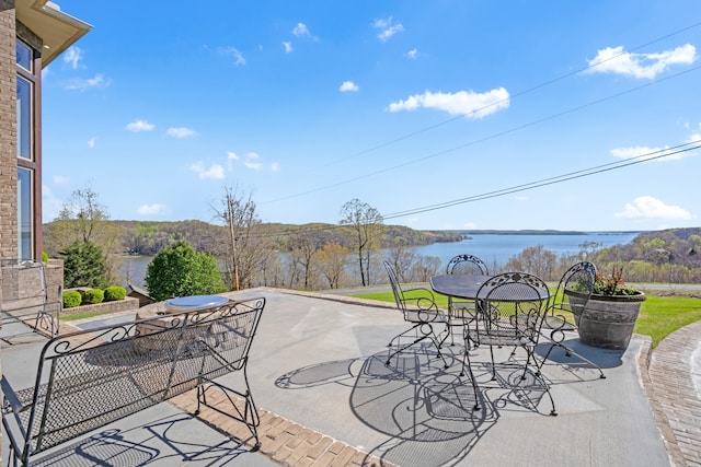 view of terrace featuring a water view