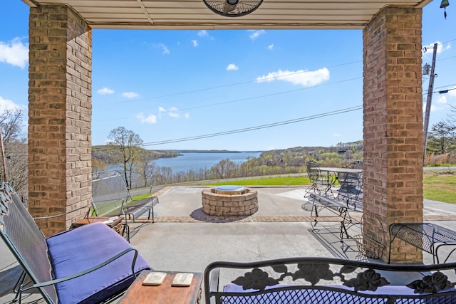 view of terrace featuring a water view