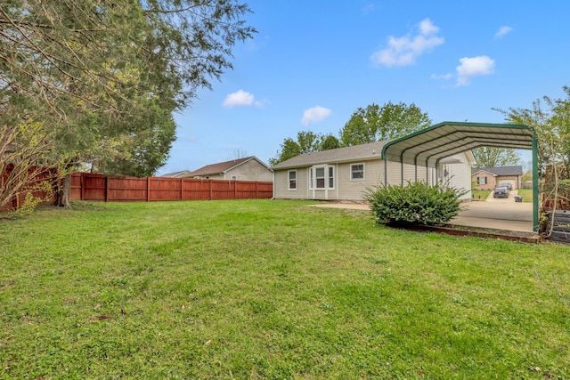 view of yard with a carport