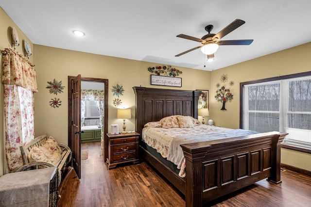 bedroom with connected bathroom, ceiling fan, and dark hardwood / wood-style floors