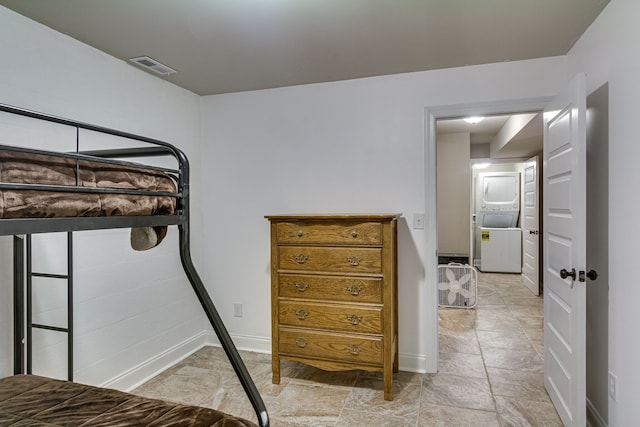 bedroom with light tile floors