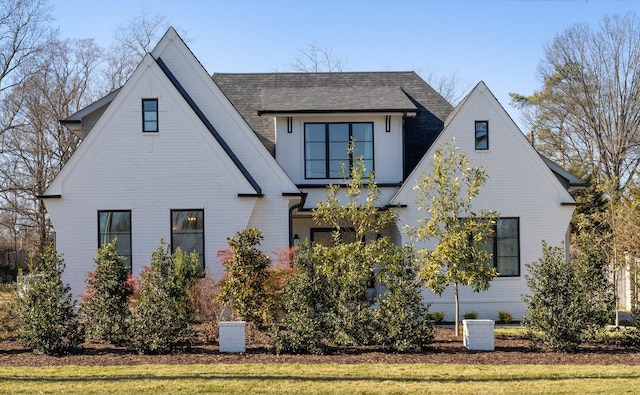 exterior space with a front lawn