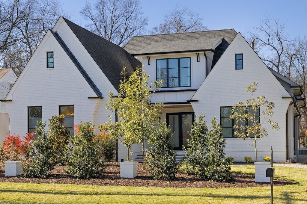 view of front of home with a front yard