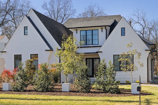 view of front of home with a front yard