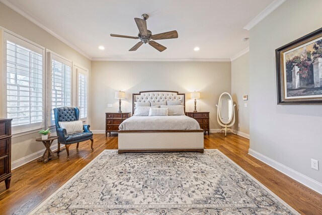 bedroom with ceiling fan, crown molding, and dark hardwood / wood-style floors