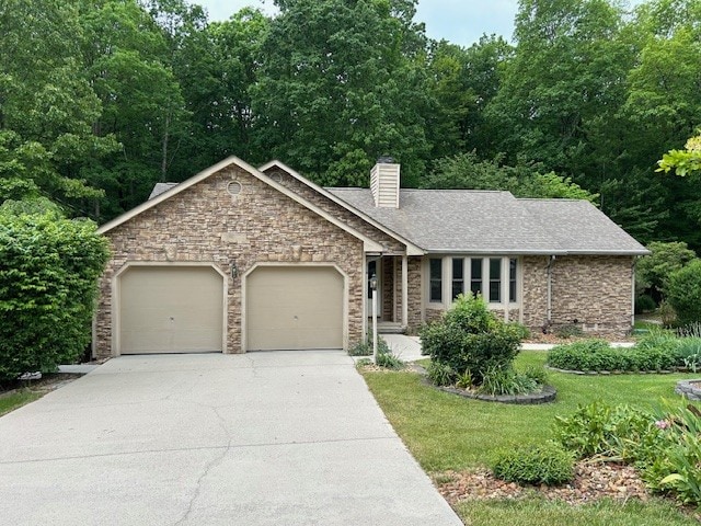 view of front facade featuring a front lawn and a garage