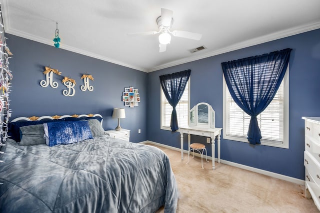 bedroom with ceiling fan, crown molding, and light colored carpet