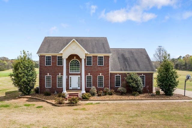 colonial house with a front yard