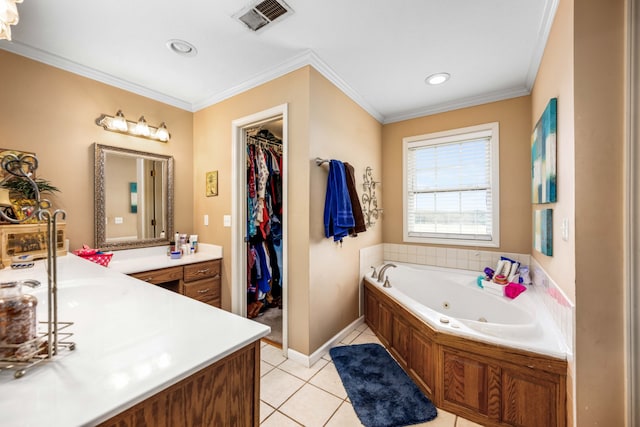 bathroom with tile floors, a bathing tub, vanity, and crown molding