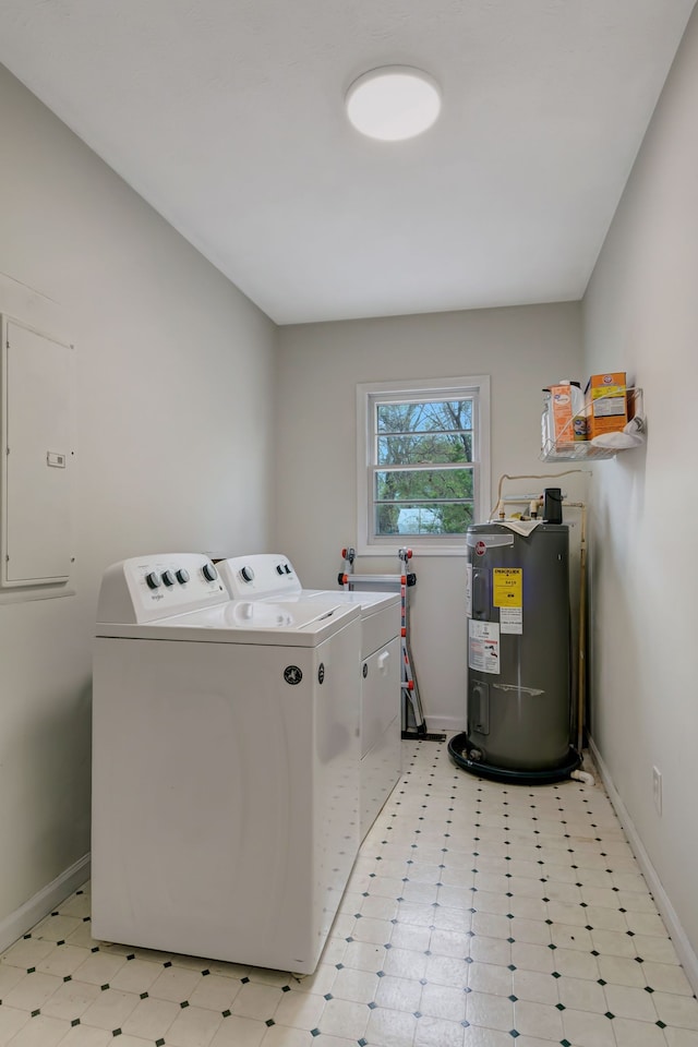 washroom with washer and dryer, electric panel, and electric water heater