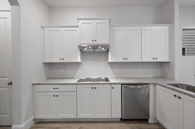 kitchen with white cabinets, dishwasher, hardwood / wood-style flooring, and black electric stovetop