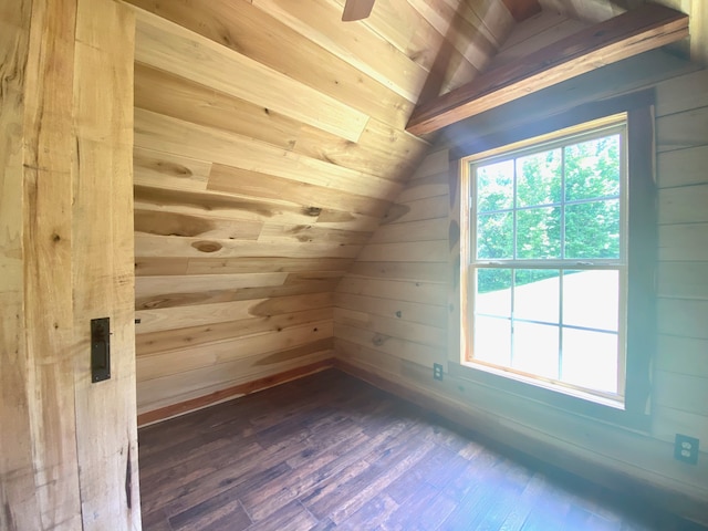 bonus room featuring wood ceiling, vaulted ceiling, wooden walls, and dark wood-type flooring