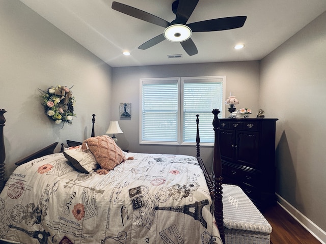 bedroom featuring dark hardwood / wood-style floors and ceiling fan