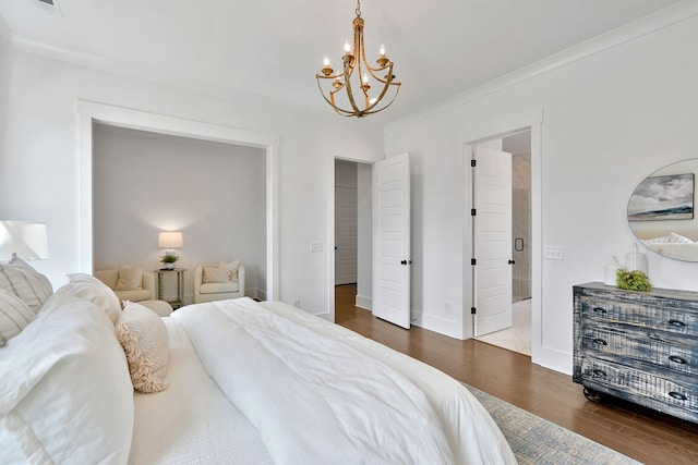 bedroom with ornamental molding, an inviting chandelier, and dark wood-type flooring