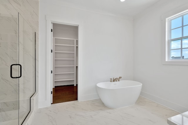 bathroom featuring separate shower and tub and tile flooring