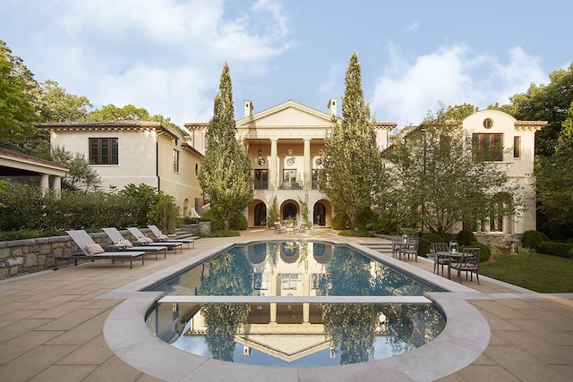 view of pool featuring a patio area