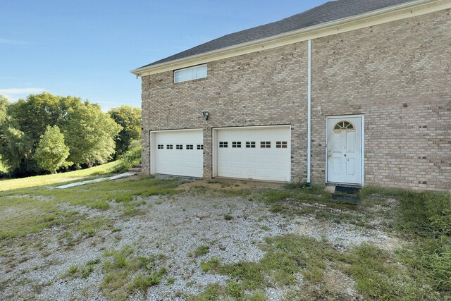 view of home's exterior featuring a garage