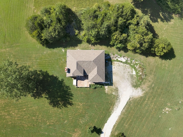 birds eye view of property with a rural view