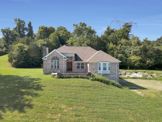 view of front of home with a front lawn