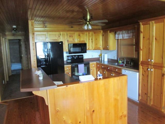 kitchen with ceiling fan, sink, dark wood-type flooring, wood ceiling, and black appliances