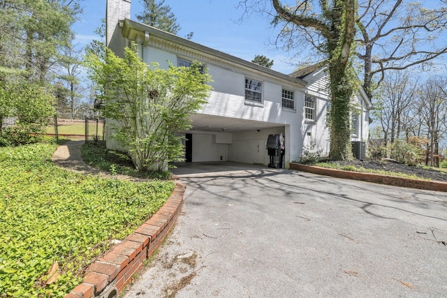 view of front facade with a carport