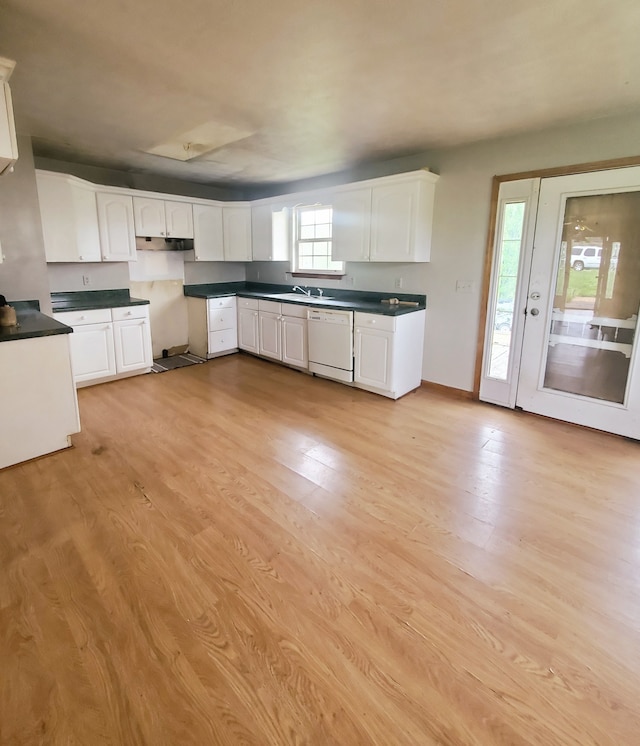 kitchen with light hardwood / wood-style flooring, dishwasher, white cabinetry, and sink