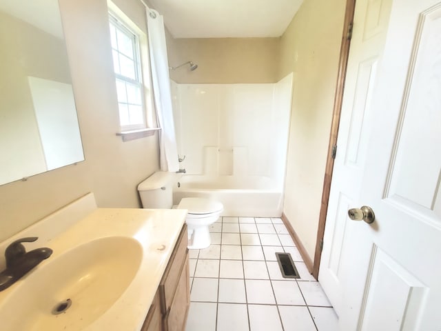 full bathroom featuring washtub / shower combination, vanity, toilet, and tile flooring