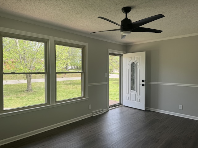 interior space with a healthy amount of sunlight, dark hardwood / wood-style floors, and ceiling fan