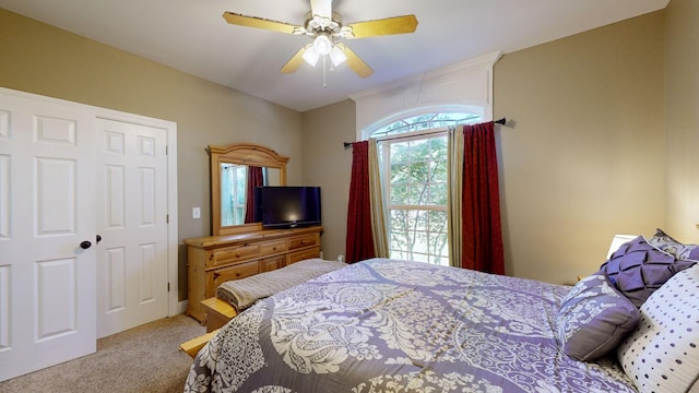 bedroom with carpet flooring and ceiling fan