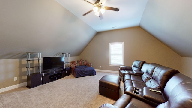 carpeted living room featuring vaulted ceiling and ceiling fan