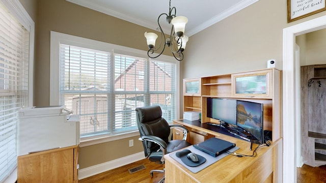 home office featuring a chandelier, crown molding, and dark wood-type flooring