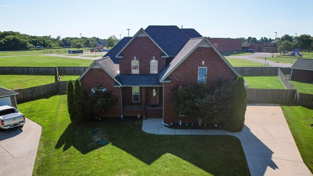 view of front of home with a front lawn