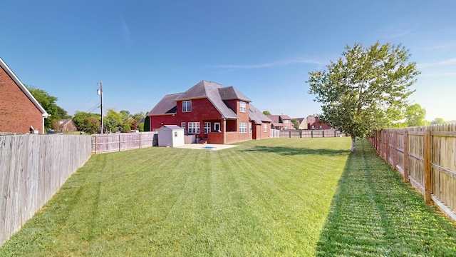 view of yard with a shed