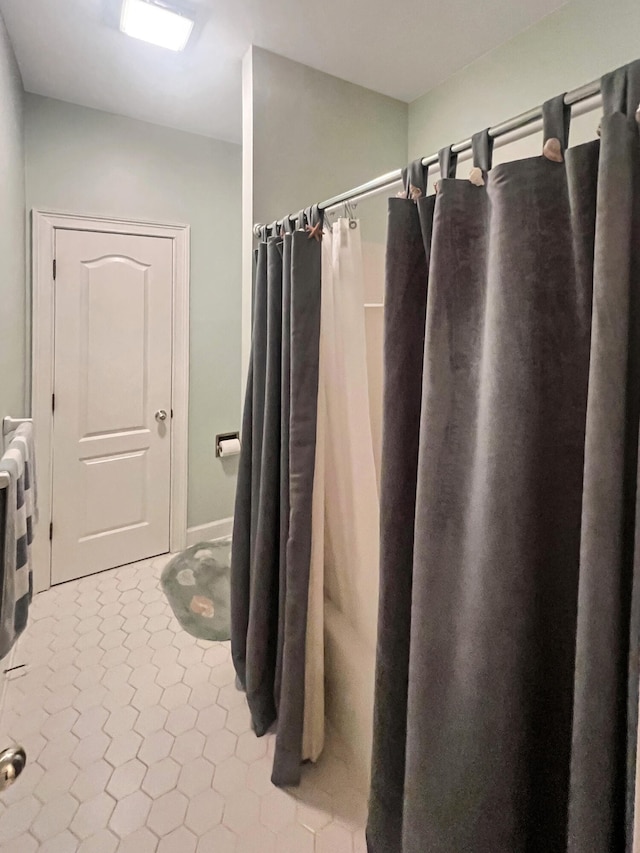 bathroom featuring tile flooring