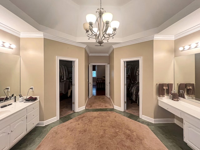 bathroom with ornamental molding, tile floors, vanity, and a notable chandelier