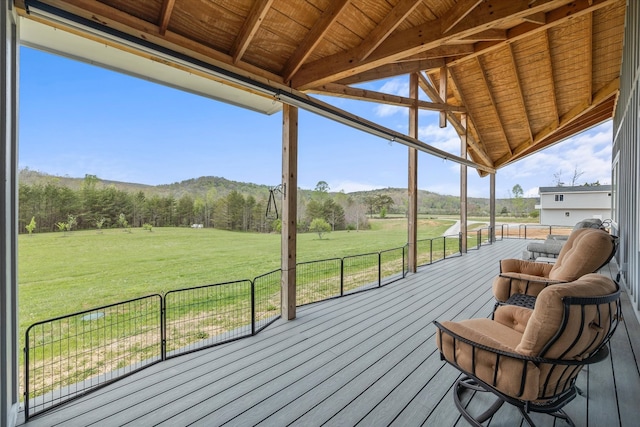 sunroom / solarium featuring a rural view, wood ceiling, and lofted ceiling with beams