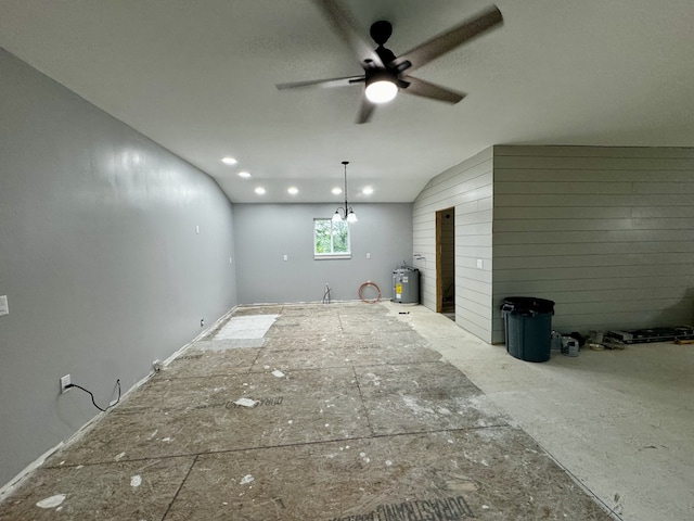 unfurnished living room featuring ceiling fan and a textured ceiling