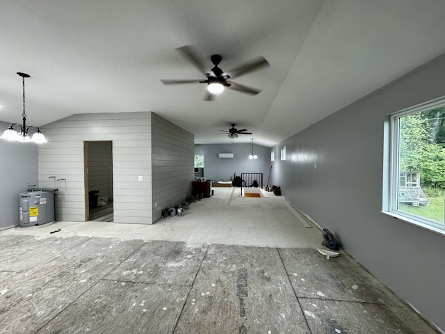 garage featuring ceiling fan and an AC wall unit