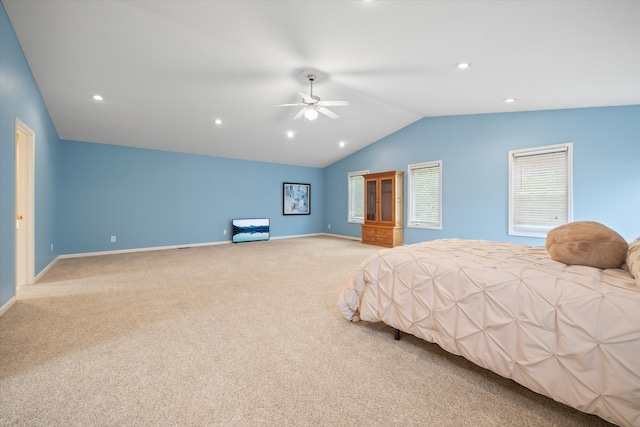 carpeted bedroom featuring ceiling fan and lofted ceiling