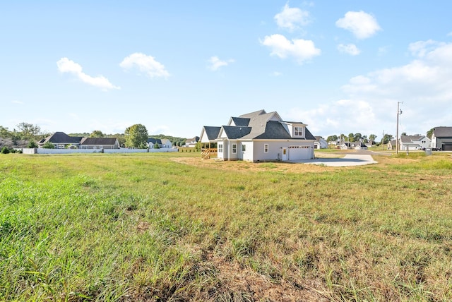 view of yard with a garage