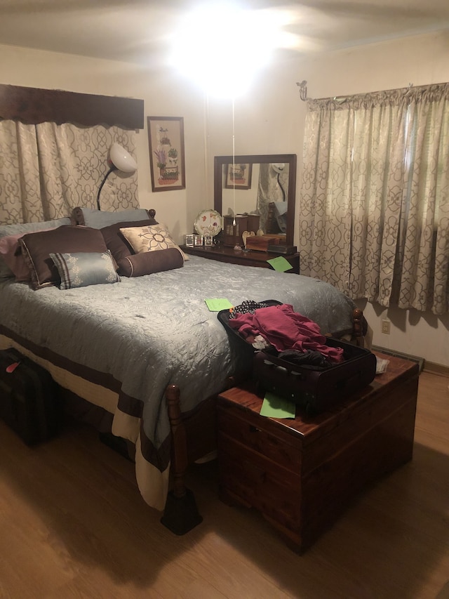 bedroom featuring hardwood / wood-style flooring