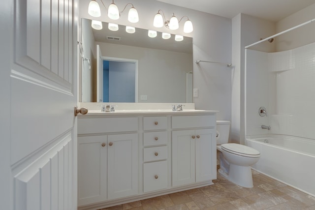 full bathroom with vanity, toilet, and bathtub / shower combination